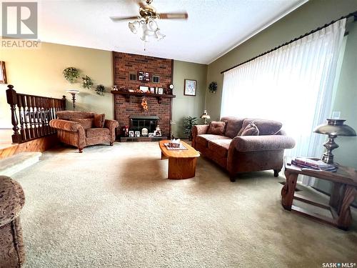 515 Main Street, Turtleford, SK - Indoor Photo Showing Living Room With Fireplace