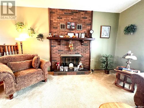 515 Main Street, Turtleford, SK - Indoor Photo Showing Living Room With Fireplace