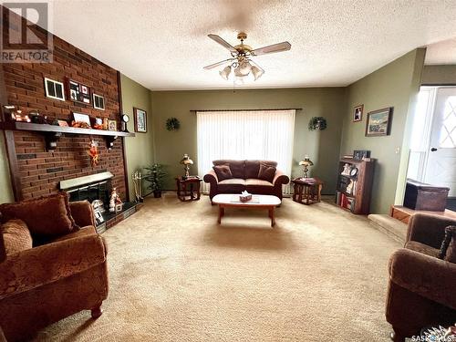 515 Main Street, Turtleford, SK - Indoor Photo Showing Living Room With Fireplace