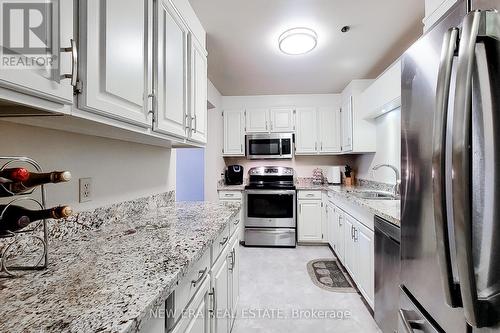 205 - 6 Niagara Street, Grimsby, ON - Indoor Photo Showing Kitchen With Stainless Steel Kitchen