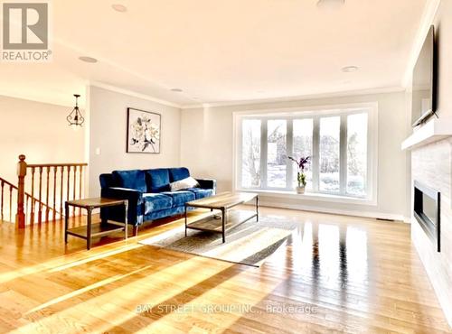 5173 Rice Lake Drive N, Hamilton Township, ON - Indoor Photo Showing Living Room With Fireplace