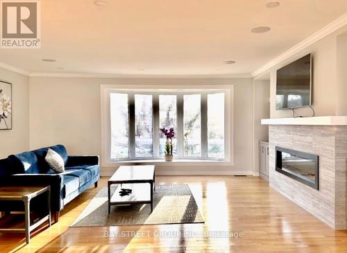 5173 Rice Lake Drive N, Hamilton Township, ON - Indoor Photo Showing Living Room With Fireplace