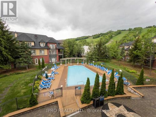 228/230 - 156 Jozo Weider Boulevard E, Blue Mountains, ON - Outdoor With In Ground Pool