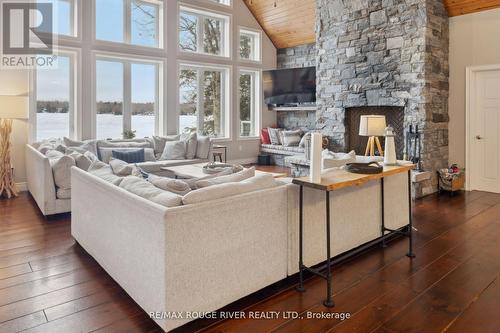 2-1456 Acton Island Road, Muskoka Lakes, ON - Indoor Photo Showing Living Room With Fireplace