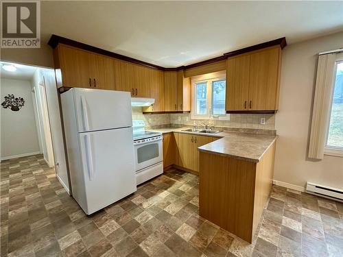 3 Dube Street, Edmundston, NB - Indoor Photo Showing Kitchen With Double Sink