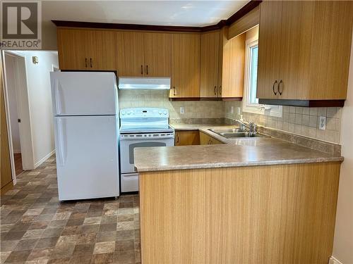 3 Dube Street, Edmundston, NB - Indoor Photo Showing Kitchen With Double Sink