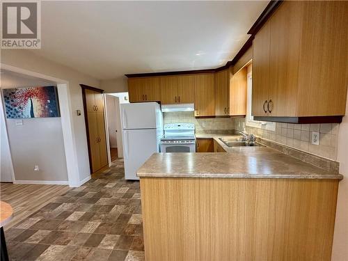 3 Dube Street, Edmundston, NB - Indoor Photo Showing Kitchen With Double Sink