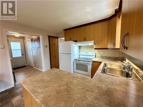 3 Dube Street, Edmundston, NB - Indoor Photo Showing Kitchen With Double Sink