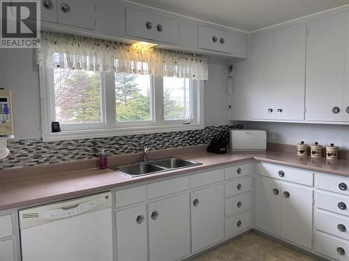 33 Main Street, Stephenville Crossing, NL - Indoor Photo Showing Kitchen With Double Sink