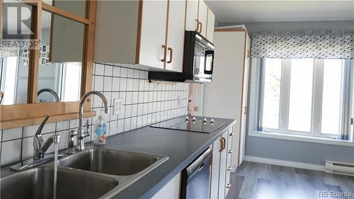 12 Macintosh Crescent, Linton Corner, NB - Indoor Photo Showing Kitchen With Double Sink