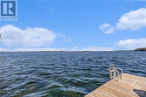 Jump off the dock! - 599 Big Rideau North Shore Road, Perth, ON - Outdoor With Body Of Water With View