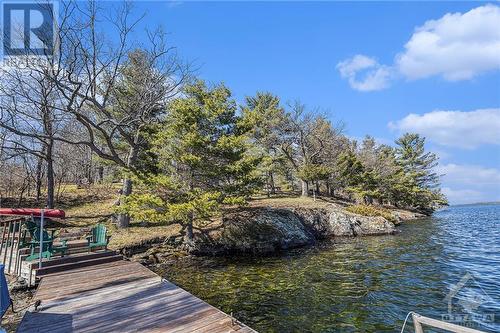 wade into the water waterfront - 599 Big Rideau North Shore Road, Perth, ON - Outdoor With Body Of Water With View