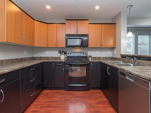 209-2685 Deville Rd, Langford, BC - Indoor Photo Showing Kitchen With Double Sink