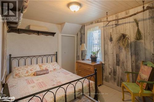 1429 Tamarack Lake Road, Highlands East, ON - Indoor Photo Showing Bedroom