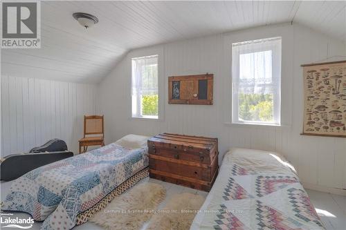 1429 Tamarack Lake Road, Highlands East, ON - Indoor Photo Showing Bedroom