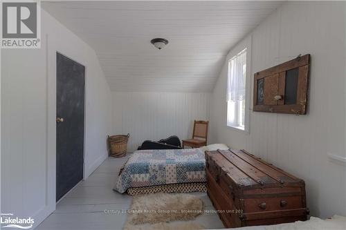 1429 Tamarack Lake Road, Highlands East, ON - Indoor Photo Showing Bedroom