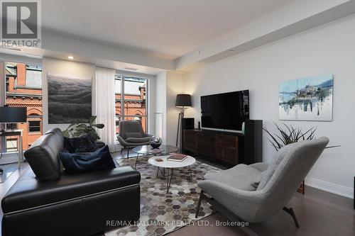 714 - 55 Front Street E, Toronto, ON - Indoor Photo Showing Living Room
