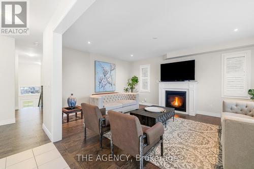 77 Sutcliffe Way, New Tecumseth, ON - Indoor Photo Showing Living Room With Fireplace
