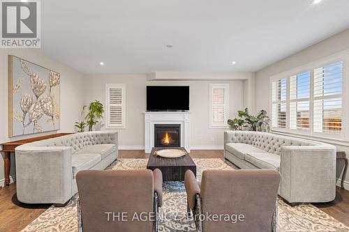 77 Sutcliffe Way, New Tecumseth, ON - Indoor Photo Showing Living Room With Fireplace