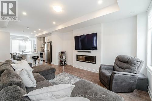 236 Royal Northern Path, Oshawa, ON - Indoor Photo Showing Living Room With Fireplace