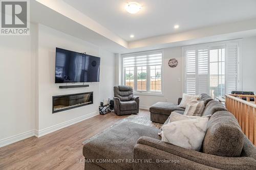 236 Royal Northern Path, Oshawa, ON - Indoor Photo Showing Living Room With Fireplace