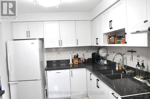 13 - 5021 Sheppard Avenue E, Toronto, ON - Indoor Photo Showing Kitchen With Double Sink