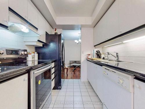 207-45 Kingsbridge Garden Circ, Mississauga, ON - Indoor Photo Showing Kitchen With Double Sink