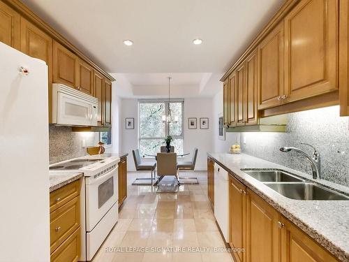 406-2662 Bloor St W, Toronto, ON - Indoor Photo Showing Kitchen With Double Sink