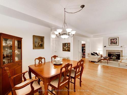 406-2662 Bloor St W, Toronto, ON - Indoor Photo Showing Dining Room With Fireplace