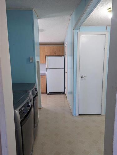 20 South Railway Avenue, Minto, MB - Indoor Photo Showing Laundry Room