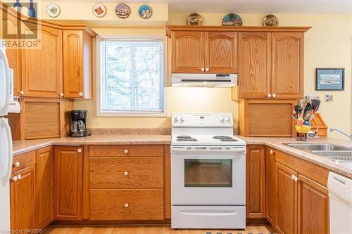 Convenient fully equipped kitchen w double sinks and dishwasher. - 108 Fedy Drive, Sauble Beach, ON - Indoor Photo Showing Kitchen With Double Sink