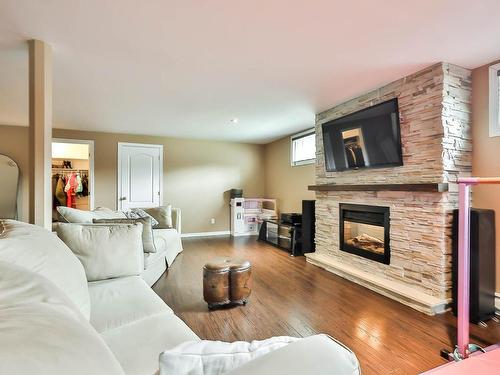 Family room - 212 Rue Des Oeillets, Gatineau (Gatineau), QC - Indoor Photo Showing Living Room With Fireplace
