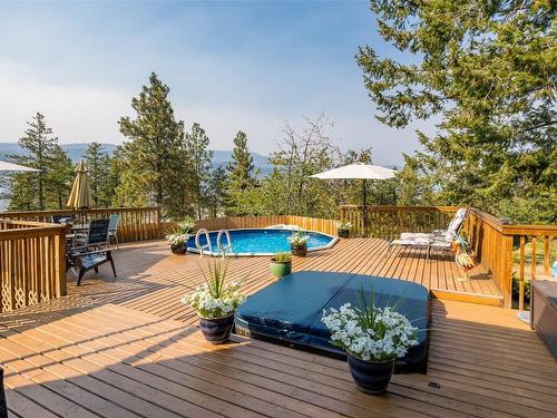 1996 Tomat Avenue, Kelowna, BC - Outdoor With Above Ground Pool With Deck Patio Veranda With Exterior