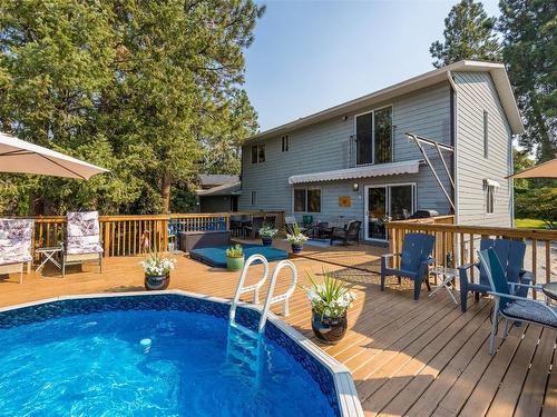1996 Tomat Avenue, Kelowna, BC - Outdoor With Above Ground Pool With Deck Patio Veranda With Exterior