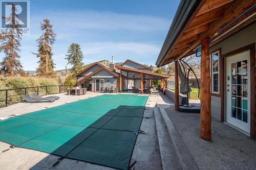 1298 Belgo Road, Kelowna, BC - Outdoor With In Ground Pool With Deck Patio Veranda