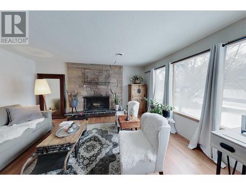 10617 81St Street, Osoyoos, BC - Indoor Photo Showing Living Room With Fireplace