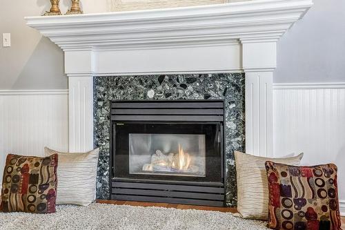 10 Summerfield Avenue, Stoney Creek, ON - Indoor Photo Showing Living Room With Fireplace