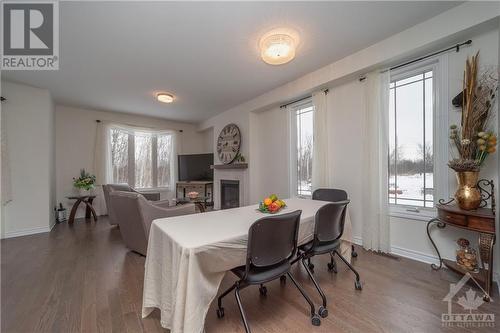 655 Persimmon Way, Ottawa, ON - Indoor Photo Showing Dining Room With Fireplace