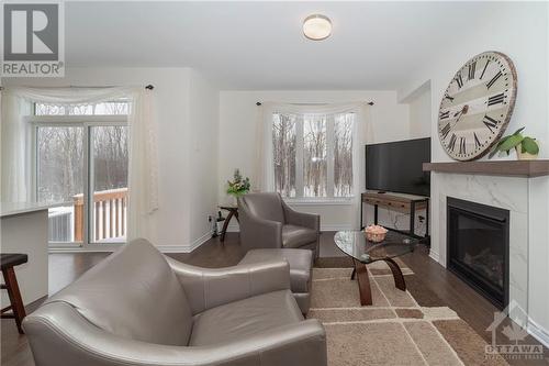 655 Persimmon Way, Ottawa, ON - Indoor Photo Showing Living Room With Fireplace