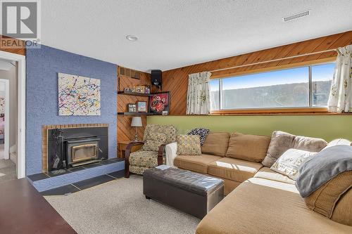 1845 Hayashi Road, Kelowna, BC - Indoor Photo Showing Living Room With Fireplace