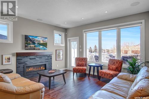 3918 Sandhill Crescent, Regina, SK - Indoor Photo Showing Living Room With Fireplace