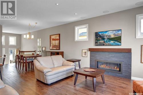 3918 Sandhill Crescent, Regina, SK - Indoor Photo Showing Living Room With Fireplace