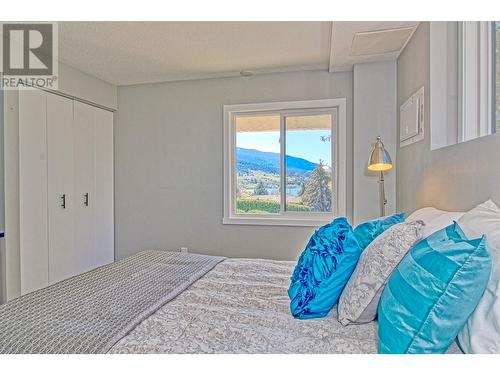 12311 Husband Road, Coldstream, BC - Indoor Photo Showing Bedroom