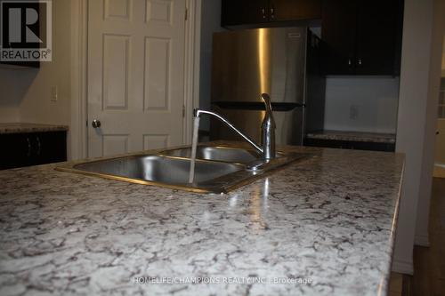 3 Tegan Court E, Loyalist, ON - Indoor Photo Showing Kitchen With Double Sink