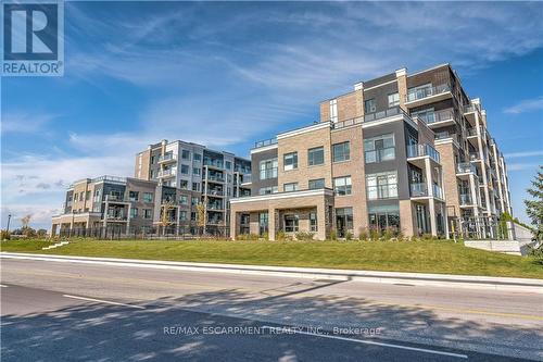 634 - 5055 Greenlane Road, West Lincoln, ON - Outdoor With Balcony With Facade