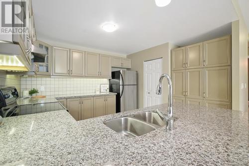 301 - 148 Third Street, Cobourg, ON - Indoor Photo Showing Kitchen With Double Sink