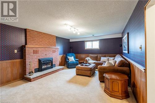 616 Stonebury Crescent, Waterloo, ON - Indoor Photo Showing Living Room With Fireplace