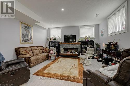 22345 Allen Road, Strathroy-Caradoc, ON - Indoor Photo Showing Living Room With Fireplace