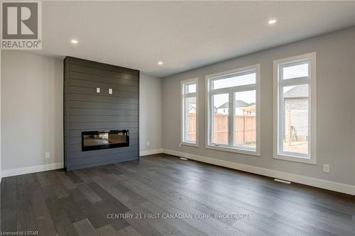 92 Aspen Circle, Thames Centre, ON - Indoor With Fireplace