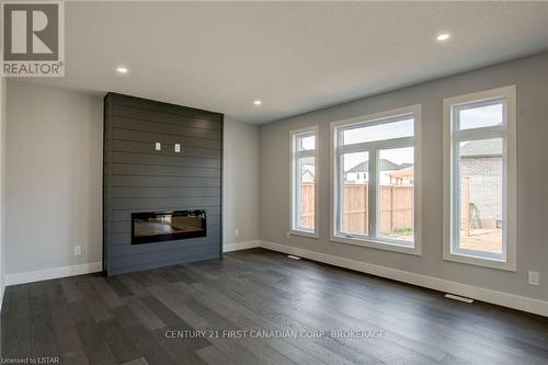 92 Aspen Circle, Thames Centre, ON - Indoor Photo Showing Other Room With Fireplace
